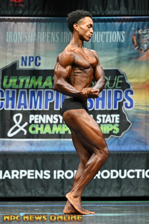 Clarence side chest pose on the NPC stage